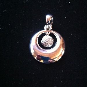 Pendent slide, cut crystals.