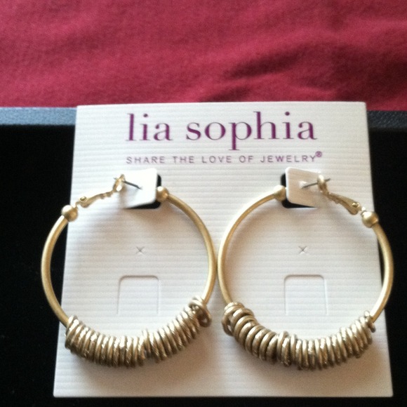Pierced hoop with little hoops earrings.