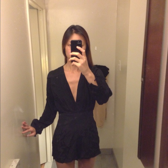 Black one piece romper bought on nastygal.