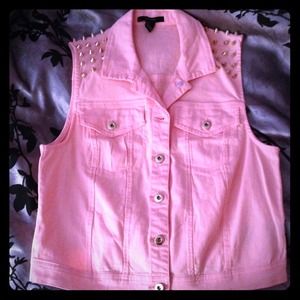 Casual peach vest, with gold accents.