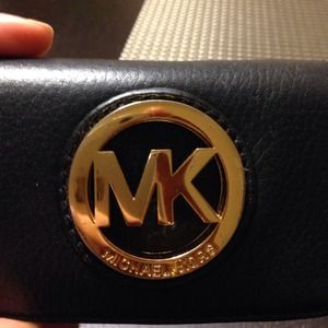 Small, black leather wallet