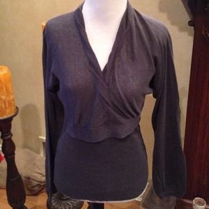 Beautiful charcoal grey sweater. Deep V neck