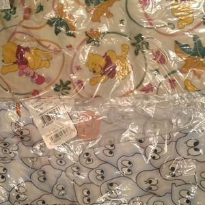 2 Scrub Jackets Pooh and ghost Size Large