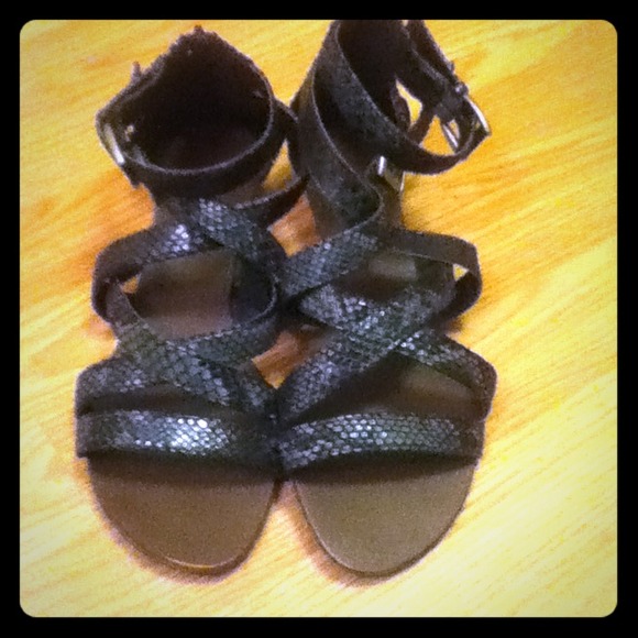 Reposhing black gladiator sandals