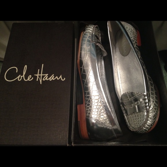 Brand new Cole Haan silver flats size 6
