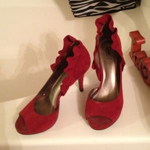 Red suede Carlos Santana  heels.