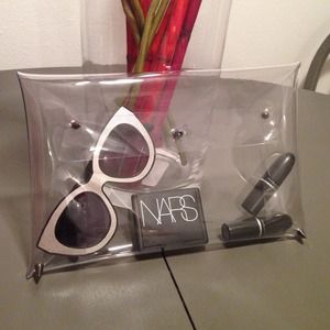 Clear plastic clutch with spikes