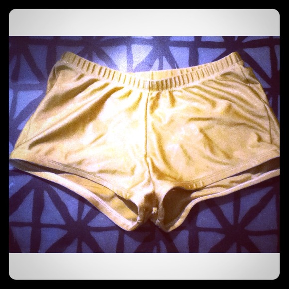 Gold sparkly rave booty shorts