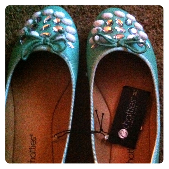 Teal flats with jewels on them