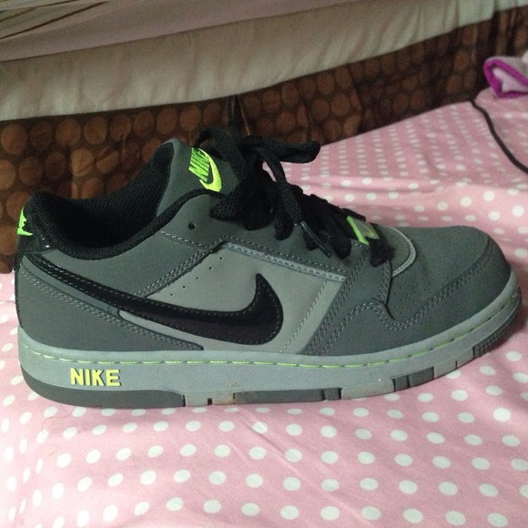 Nike neon green and gray shoes.