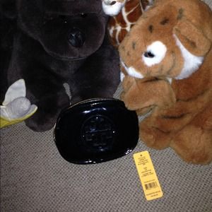 Authentic Tory Burch small patent cosmetic case.