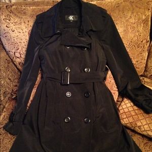 Calvin Klein trench coat with wool lining inside.