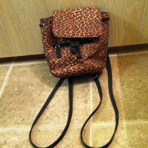 Book bag style leopard purse