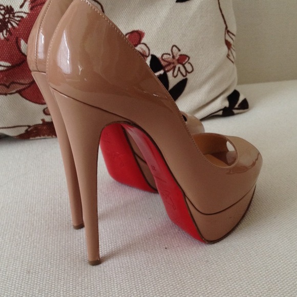Christian Louboutin Shoes - Nude Christian Louboutin Peep toes pumps.