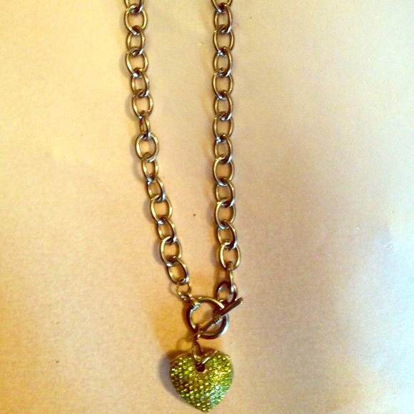 Silver toggle necklace with crystal heart charm.