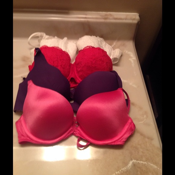 4 Victoria's Secret bras 3 are size 34A,purple 34B