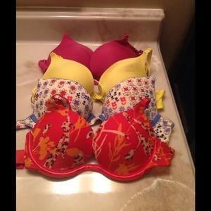 4 Victoria's Secret bras. 3 are 34B,  fustia 36B