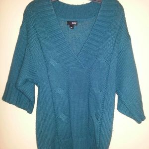 Women's teal cabel knit sweater.