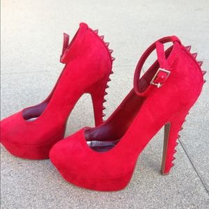 Red spiked heels with strap