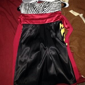 Halter top dress with big red bow in back.