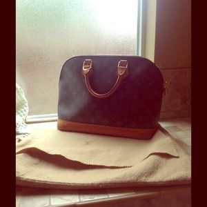 HOLD 100% Auth. LV Alma with Lock/key/Dustbag!!