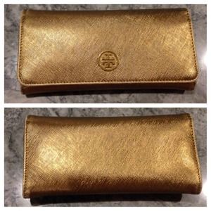 Gold AUTHENTIC Tory Burch wallet.