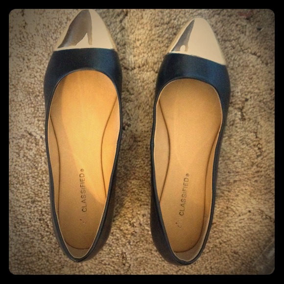 Black flats with gold toe