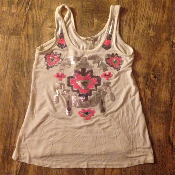 White top! With pink sequined