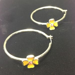 Big circle with little yellow flower earring