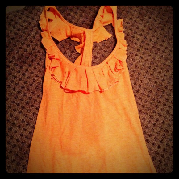 Orange open back ruffle tank