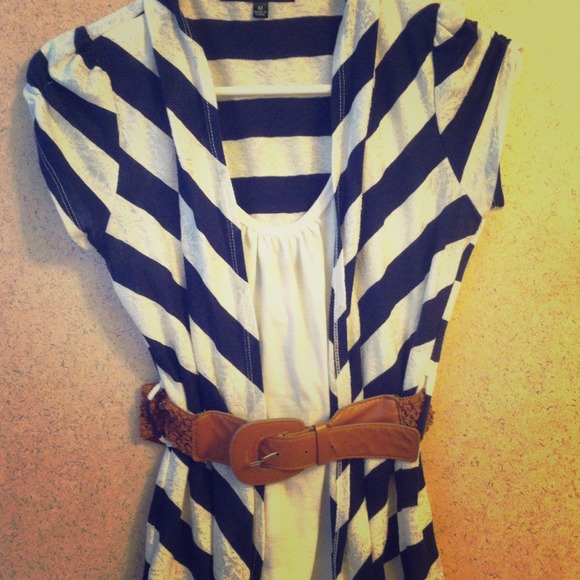 Navy blue and white shirt with brown belt