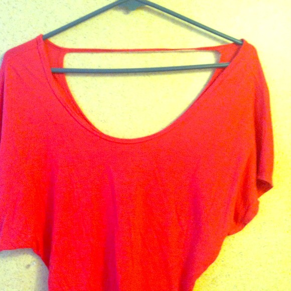 Pink slight open back shirt