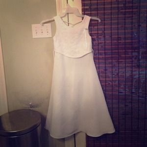 A white dress by the brand Bonnie Jean