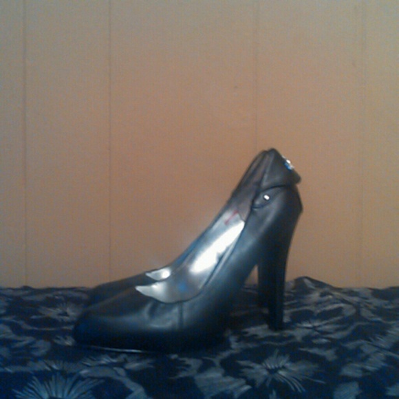 Black BabyPhat pumps never worn