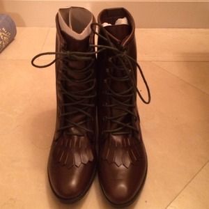 "We who see" fringe boots.