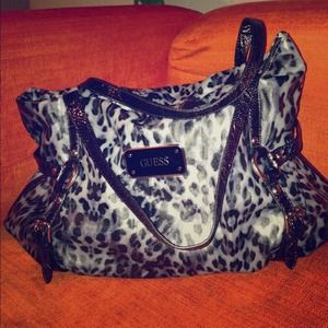 Black and gray Guess bag gently used