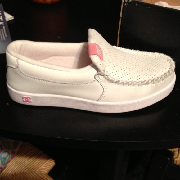 White DC slip on shoe. Size 6... Never been worn