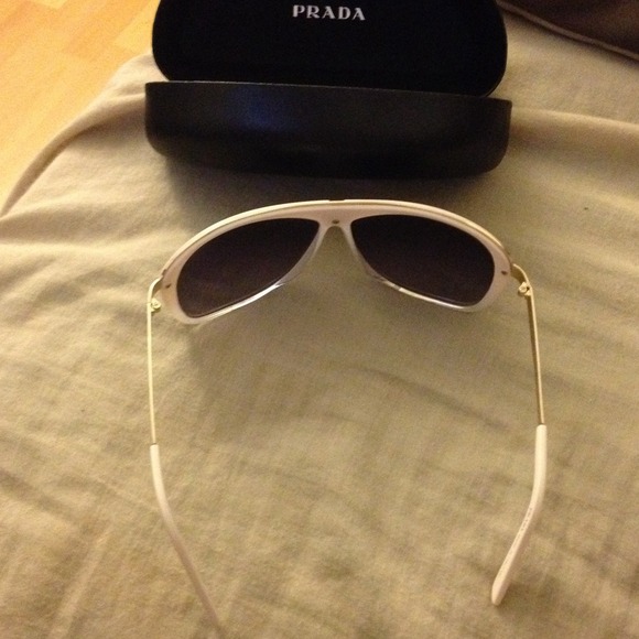 Prada sunglasses. Perfect for the beach.? main image 4