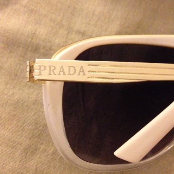 Prada sunglasses. Perfect for the beach.?