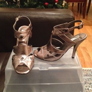 Steve Madden Peep toe sling back heel.