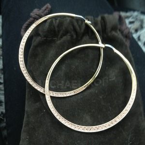 Michael Kors rose gold hoops w/ drawstring bag.