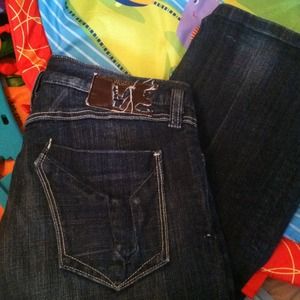 Dark wash boot cut jean size 28