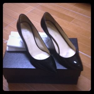 AUTHENTIC Prada black patent leather pumps