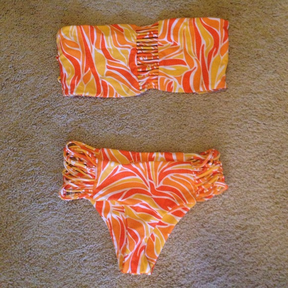 SOLDMikoh M top XS bottom.$75 for both or $40 ea