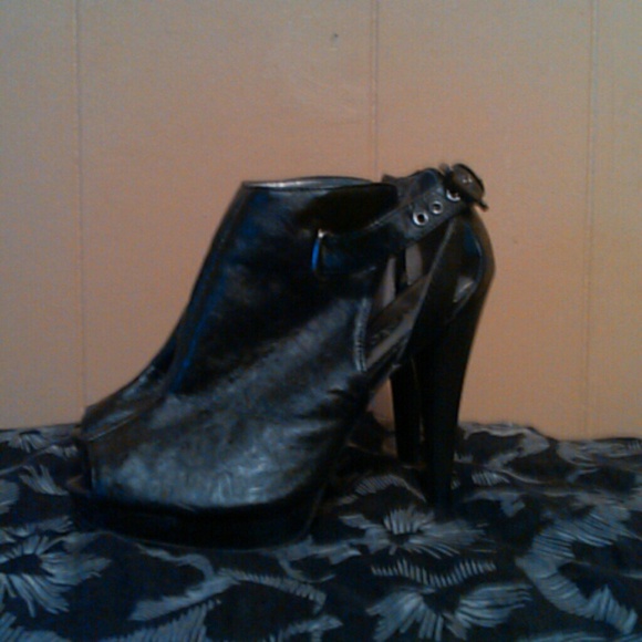 Peep toe black leather heels