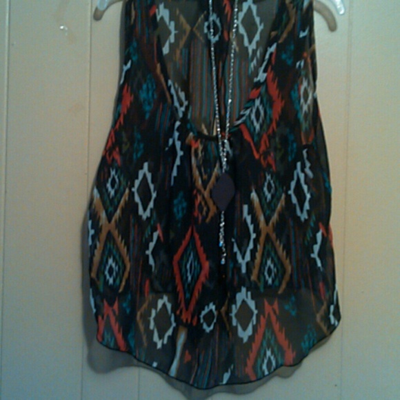 Open back shirt with chain necklace attached