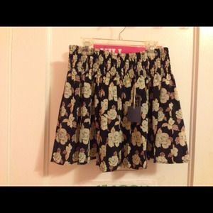 Navy blue floral skirt.