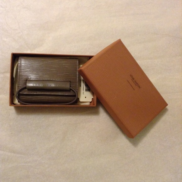 Louis Vuitton Clutches & Wallets - Louis Vuitton epi leather tri fold wallet