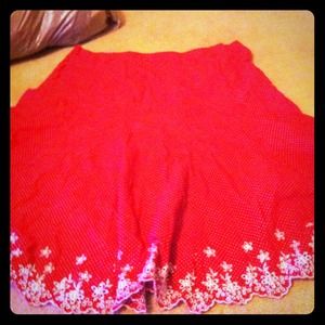 Knee length skirt red with white embroidery