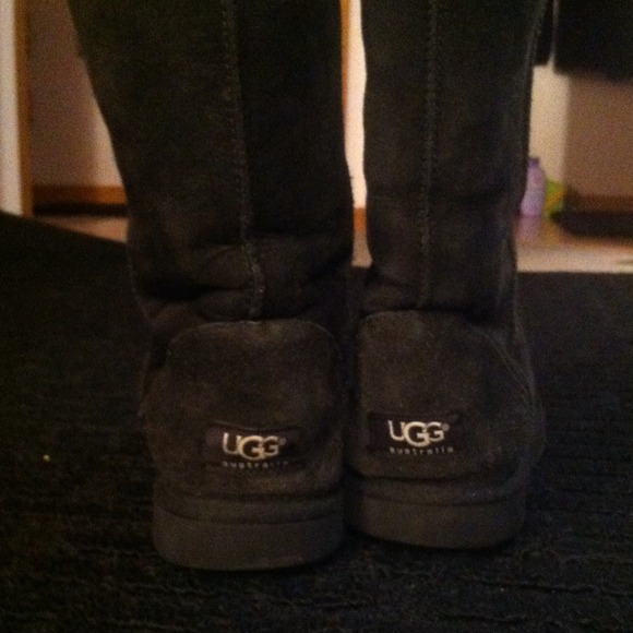 Tall black UGG boots